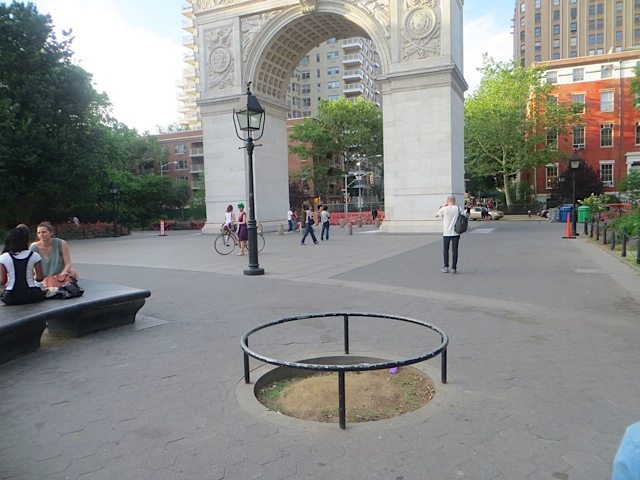 One of Four Missing Tree Pits (Previously Dead Trees) Around Fountain